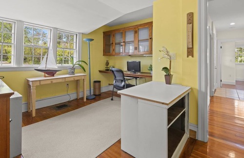 Nahant House | Edwardian home, fireplace, water views