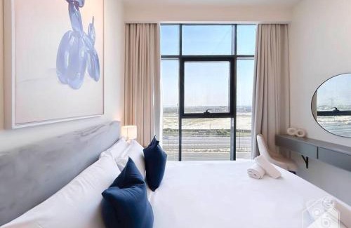 Nad Al Sheba Apartment | Elegant 1BR with Balcony in Azizi Riviera