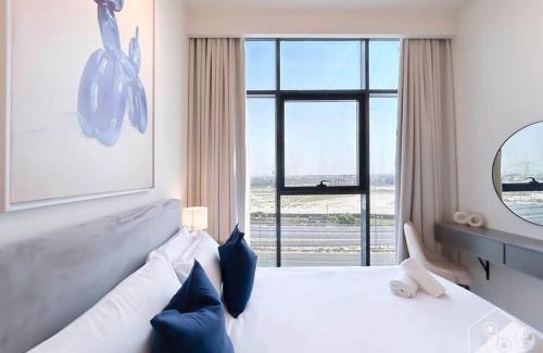 Nad Al Sheba Apartment | Elegant 1BR with Balcony in Azizi Riviera