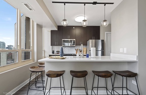 Rush and Division Apartment | Elegant 2BR with Resort Amenities & City Views