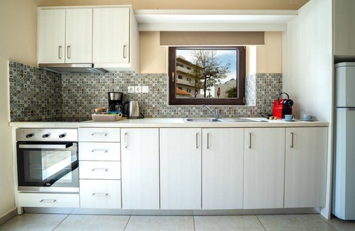 Nea Chora Apartment | Elegant, bright residense w/ ample garden, steps from sandy beach & Chania town