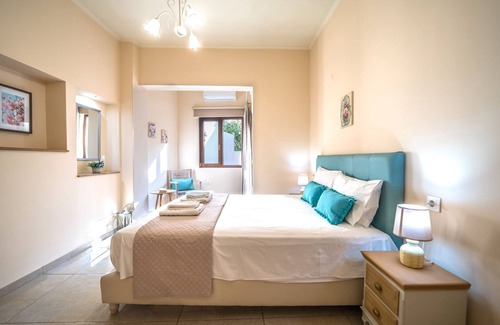 Nea Chora Apartment | Elegant, bright residense w/ ample garden, steps from sandy beach & Chania town
