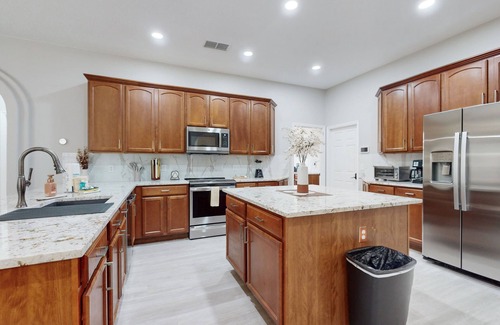 Legacy Park House | Elegant home with private pool & spa, fenced yard, lanai & themed bedrooms