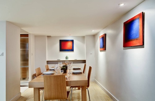 Saint-Merri Apartment | Elegant Loft in Historic Parisian Mansion with Courtyard Charm