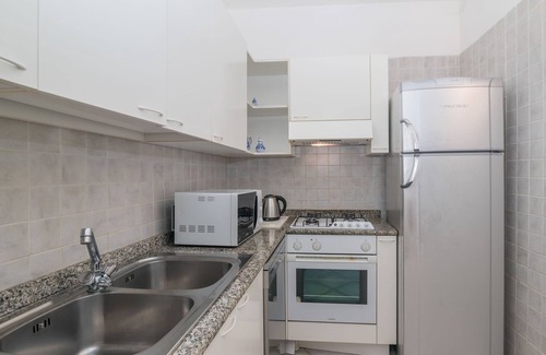 Baia Caddinas Apartment | Elicriso by Interhome