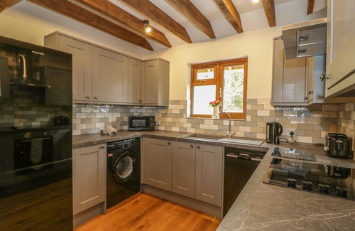 Old Cleeve Cottage | ELM LODGE, family friendly, with hot tub in Washford