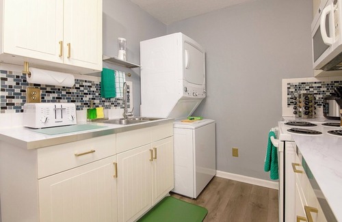 Tremont House | Emerald Oasis: Stylish Tremont 2BR Upper Unit by Christmas Story House | Parking 7 Min to Downtown