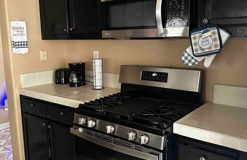 Stockton House | Enchanting 4BR with Rose Garden