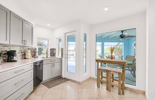 Fort Myers House | Enchanting waterfront home with pool, dock, washer/dryer, & dog-friendly