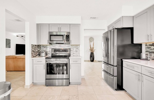 Fort Myers House | Enchanting waterfront home with pool, dock, washer/dryer, & dog-friendly