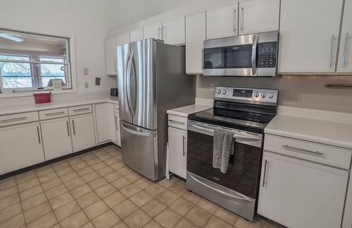 Oscoda House | Endless Summer(Oscoda, Mi) Sleeps 7, Waterfront, Indoor Pool, Hot Tub