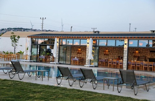 Cesme Ski Chalet | Enginar Çiçeği