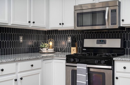 Alabaster House | Enjoy a Gardenside Getaway - Fenced Yard & Patio