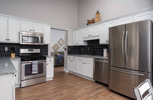 Alabaster House | Enjoy a Gardenside Getaway - Fenced Yard & Patio