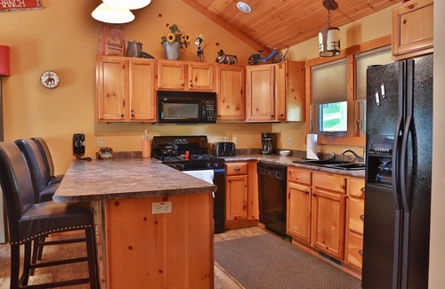 The Galena Territory House | Enjoy connecting around the fire pit as well as the view and the hot tub