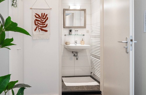 Zoutelande House | Enjoy maximum comfort in a modern, stylish room with a fully equipped private bathroom.