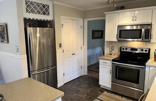 Augusta House | Enjoy the Master’s knowing the hot tub and private backyard await your return.