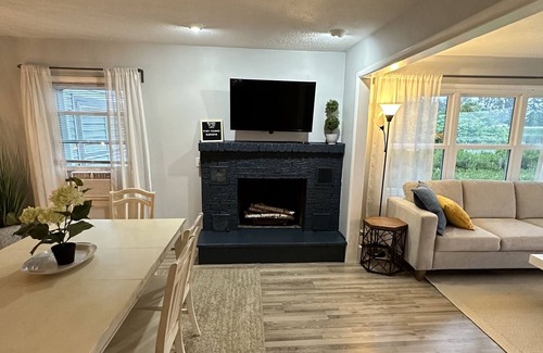 Shelbyville House | Enjoy your stay with a sandy beach on Gun Lake