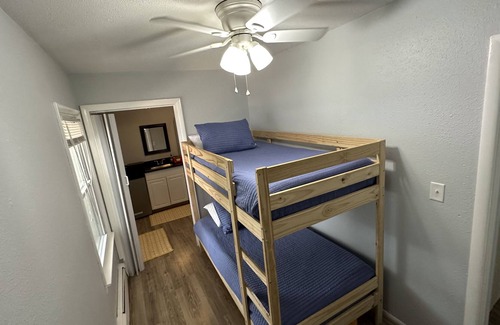 Shelbyville House | Enjoy your stay with a sandy beach on Gun Lake