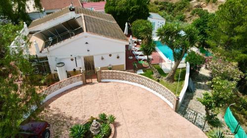 Cartama House | Escapada rural con encanto y piscina en Cártama