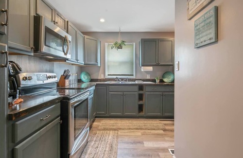 Terry Sanford House | "Escape to Ellis Hideaway: Cozy 2-Bedroom Retreat with 1.5 Baths
