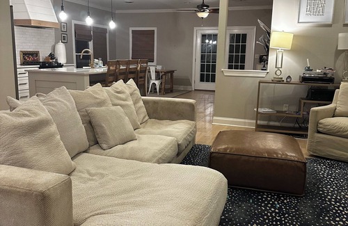 Oxford House | Escape to Serenity: Cozy Ranch Style Home with Charming Wrap-Around Porch.