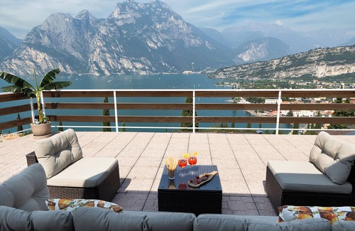 Torbole sul Garda Apartment | Exclusive residence in Torbole with breathtaking views, large terrace.