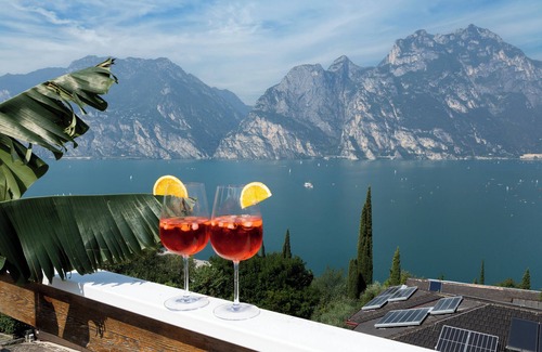 Torbole sul Garda Apartment | Exclusive residence in Torbole with breathtaking views, large terrace.