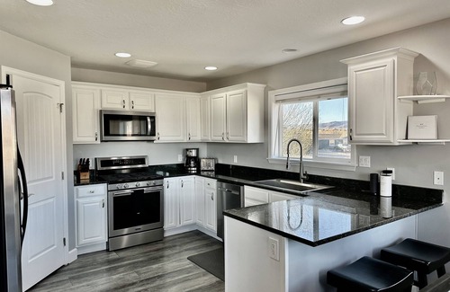 Moab South Valley House | Exclusive Retreats 6 Bedroom 6 Bath Desert Paradise with Private Heated Pool