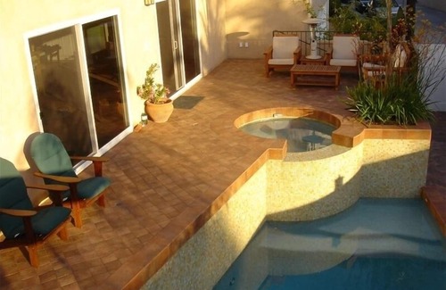 The Strand House | Experience it all! Enjoy the beach, pool, & spa in a family friendly atmosphere.