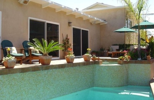 The Strand House | Experience it all! Enjoy the beach, pool, & spa in a family friendly atmosphere.