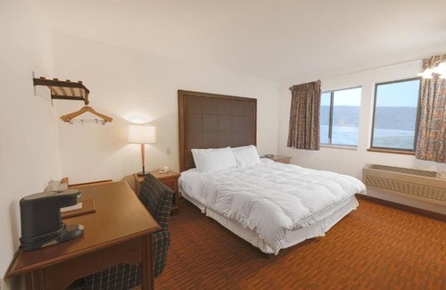 Harlan Hotel | Explore Prairie Rose, Pet Friendly Unit Stay w/Parking Included