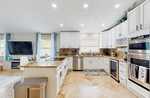 Naples Park House | Exquisite home with private pool, washer & dryer, and bikes