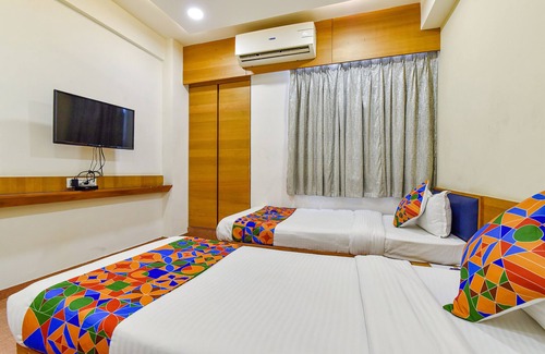 Changodar Hotel | Fabhotel Prime Grand Unity