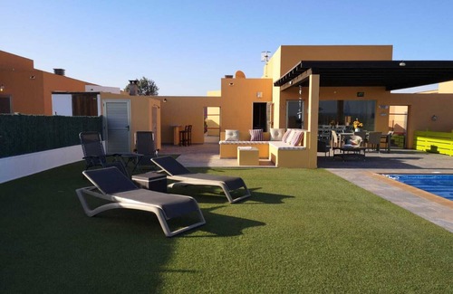 Costa de Antigua Villa | Fabulous! Golf and Sea Views Climatized pool. Wifi. BBQ Caleta de Fuste.
