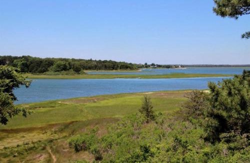 East Orleans House | Fabulous Waterfront Cottage Rental with Fire Pit near Orleans, Massachusetts