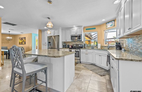 Biggar House | FABULOUS WHISKEY CREEK POOL HOUSE! SLEEPS 8! MINUTES TO GOLF AND GULF!