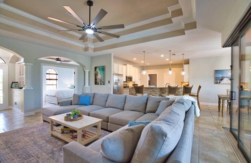 South Gulf Cove House | *Fall Savings* Luxury 4BR Canal , Spa, Dock- Near Beaches