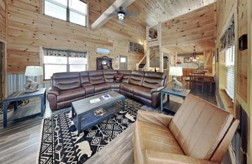 Chalet Village North House | Falling Brook – Cozy Creekside Cabin with Hot Tub, Game Loft & Dog-Friendly Comfort