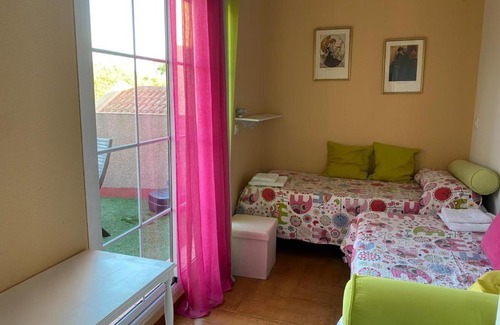 Sevilla Este House | Familia Anfitriona acoge terraza