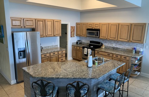 Orange Beach Condo | Family condo with gorgeous bay view, huge pool and grounds