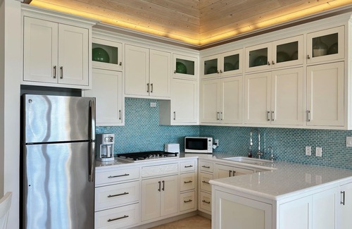 Treasure Cay House | Family estate coach house and guest house on TC beach with beautiful pool