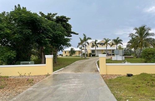 Treasure Cay House | Family estate coach house and guest house on TC beach with beautiful pool