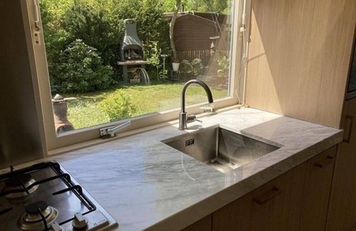 Sint Maartensvlotbrug House | Family-friendly chalet with use of park pool.