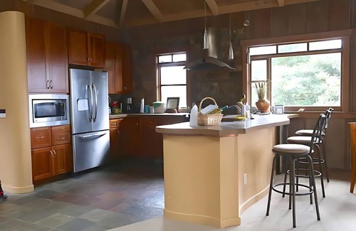 Little River House | Family friendly luxury. wrap-around decks with an ocean view, Spa, and Sauna.