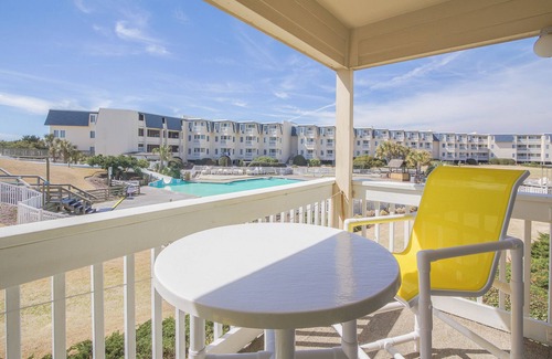 Morehead City Condo | Family Fun at 178 A Place at the Beach – 2BR Condo w/Pool & Waterslide View