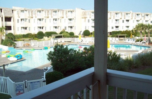 Morehead City Condo | Family Fun at 178 A Place at the Beach – 2BR Condo w/Pool & Waterslide View