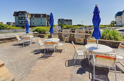 Morehead City Condo | Family Fun at 178 A Place at the Beach – 2BR Condo w/Pool & Waterslide View
