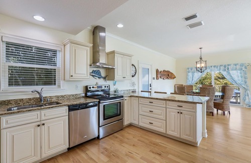 Bradenton Beach House | Family Getaway at The Sea Zoo - Bayfront with Pool, Tiki Bar, and Games!