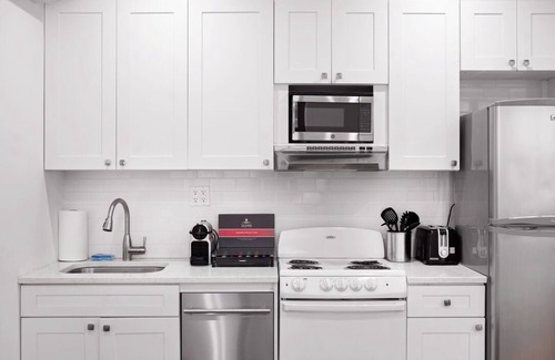 Hudson Square Apartment | Fantastic 2-Bedroom Townhouse with Private Balconies in West Village